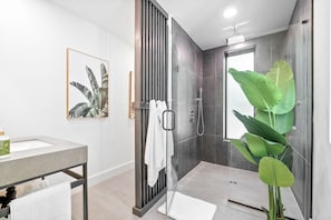 Shower, towels, soap, toilet paper