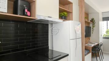 Fridge, microwave, cookware/dishes/utensils
