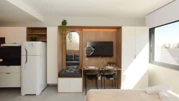 Tabla de planchar con plancha, internet y ropa de cama