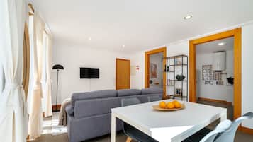 Comfort-Apartment | Wohnbereich | Flachbildfernseher
