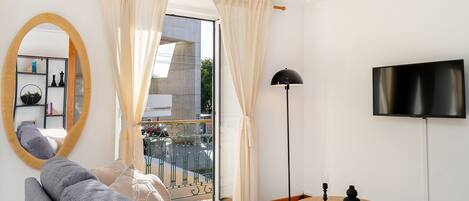 Comfort Apartment | Living area | Flat-screen TV