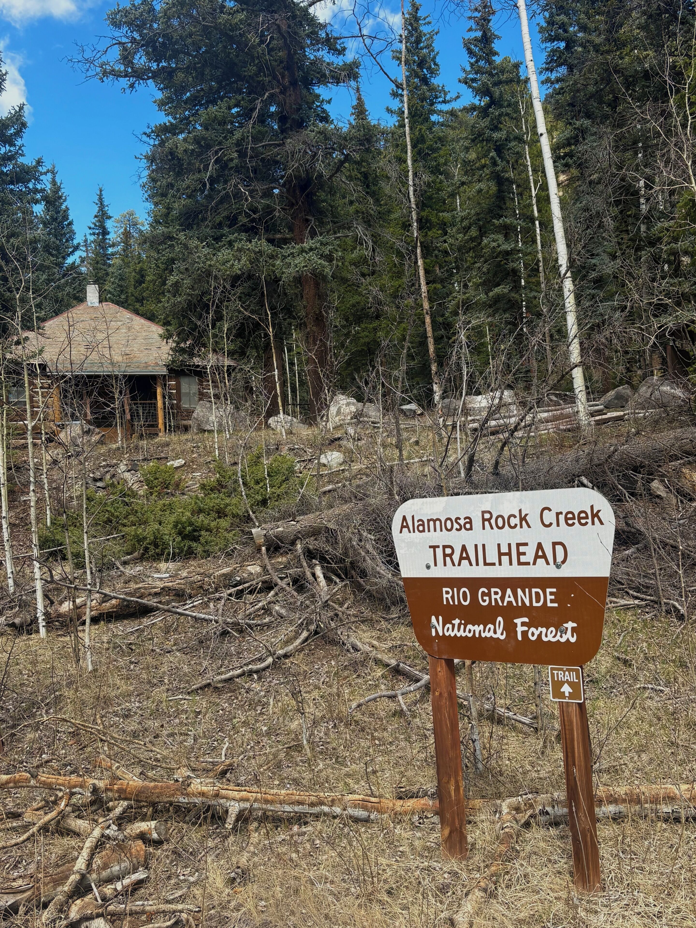 A trailhead sign for Alamosa Rock Creek Trailhead in Rio Grande National Forest.
