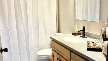 Hair dryer, towels, soap, shampoo