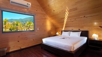 Deluxe Bungalow, Balcony, Garden View | In-room safe, desk, free WiFi