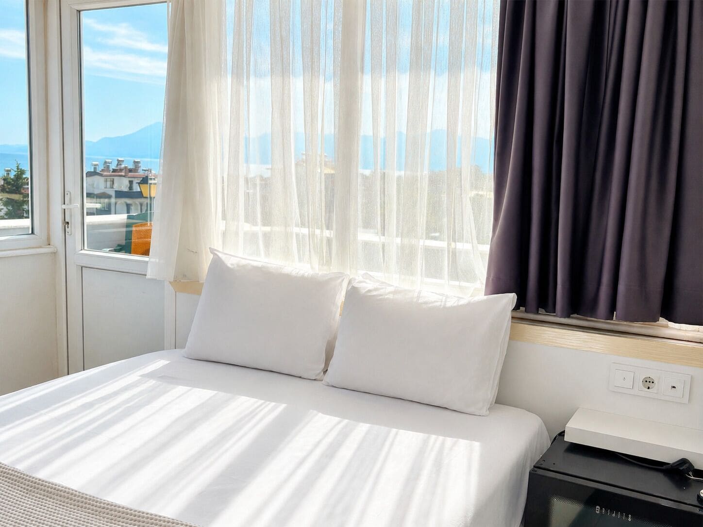 Deluxe Room, Balcony, Sea View | Minibar, free WiFi, bed sheets