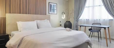 Economy Room, Balcony, City View | Desk, laptop workspace, blackout drapes, soundproofing