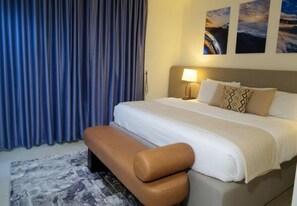 Economy Room, Balcony, City View | Desk, laptop workspace, blackout drapes, soundproofing