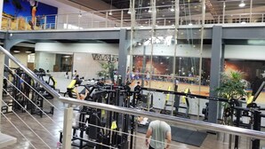 A multi-level gym with various exercise equipment, a climbing wall, and a staircase. - Sunset Place One Bedroom in Front of Pucmm (Santiago de los Caballeros)