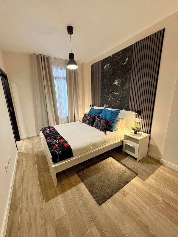 Design Studio Suite, 1 Bedroom | Down comforters, in-room safe, laptop workspace, iron/ironing board