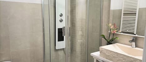 Hair dryer, bidet, towels, soap