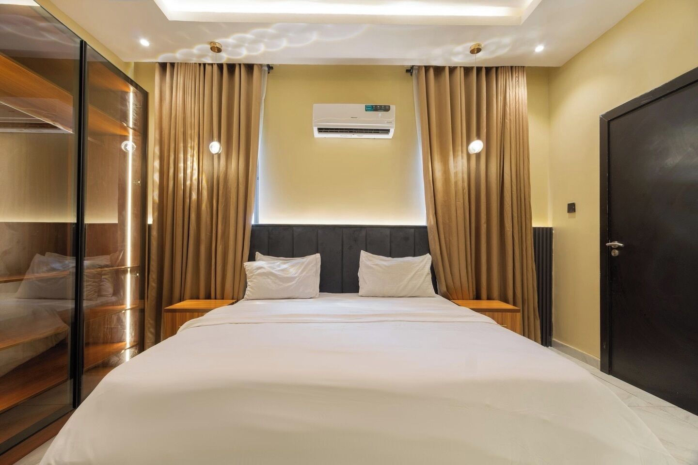 Deluxe Apartment, Balcony, City View | In-room safe, desk, laptop workspace, blackout drapes