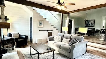 Smart TV, fireplace, books, music library