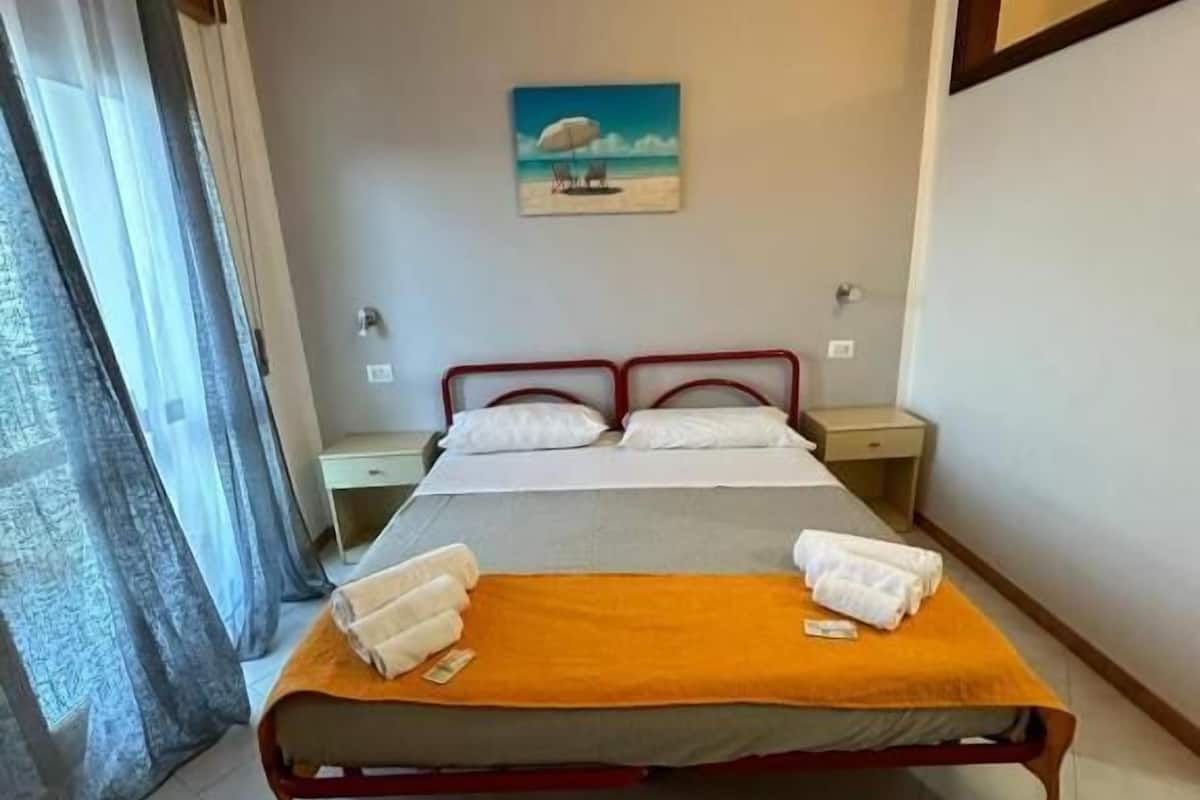 Family Room, Balcony, Sea View | Free WiFi