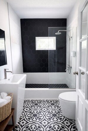 Shower, hair dryer, towels, soap