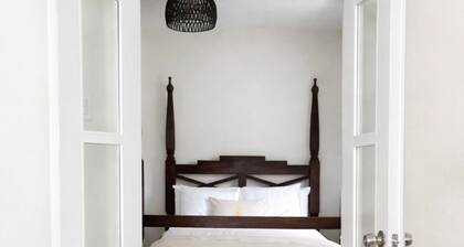 RiversEnd Guesthouse Frenchman Suite, Kitchenette • Private Patio · Beach Access