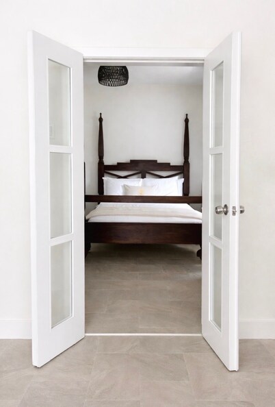 RiversEnd Guesthouse Frenchman Suite, Kitchenette • Private Patio · Beach Access
