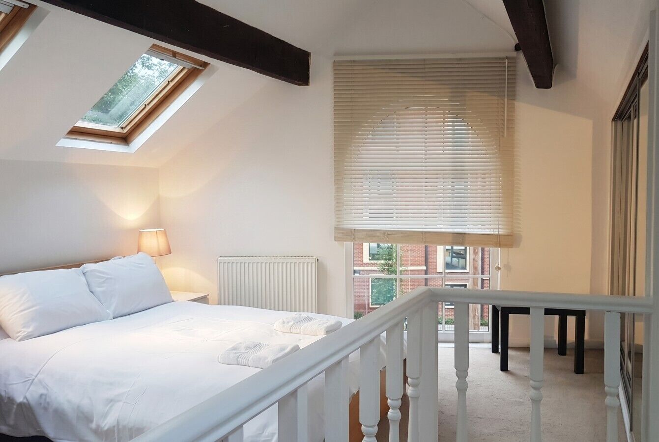 1 bedroom, desk, iron/ironing board, travel crib