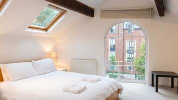 1 bedroom, desk, iron/ironing board, travel cot