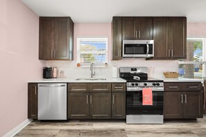 Fridge, microwave, oven, stovetop - Opalite on Sunset | Pink Beach Retreat (Panama City Beach)