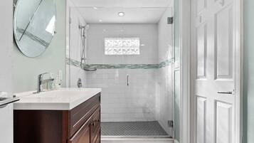 Shower, towels, soap, toilet paper