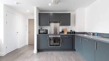 Fridge, microwave, electric kettle, toaster