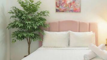 Deluxe Townhome, Balcony, City View | Desk, laptop workspace, blackout drapes, soundproofing