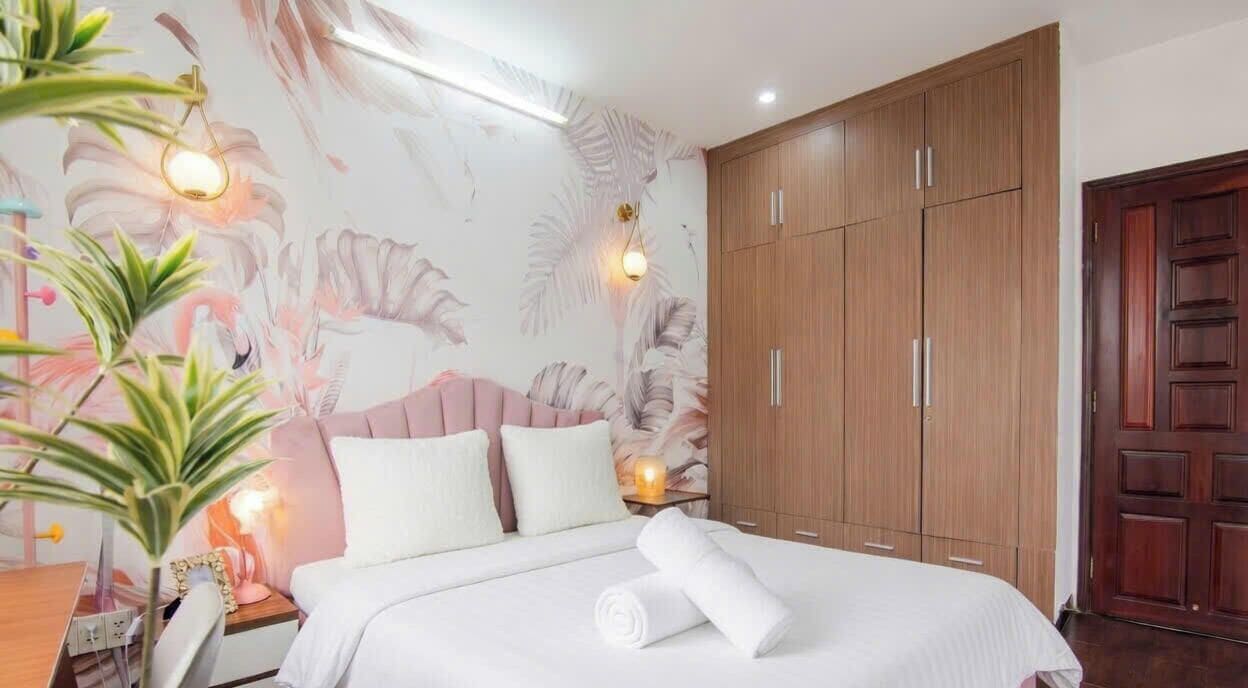 Deluxe Townhome, Balcony, City View | Desk, laptop workspace, blackout drapes, soundproofing