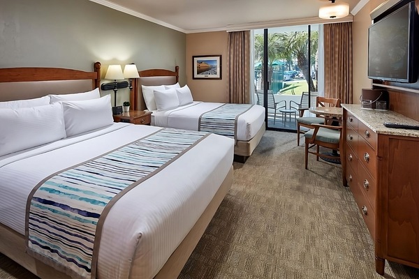 Unwind in crisp beds and step out to sunny views.