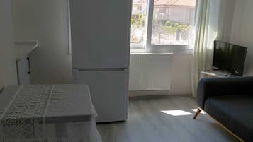 Habitación de lujo, vistas a la ciudad | Zona de estar