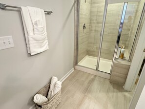 Shower, hair dryer, towels, soap