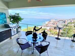 Outdoor dining - Luxury PV Amapas Condo • Sweeping Ocean & City Views • Walk to Los Muertos Beach (Puerto Vallarta)