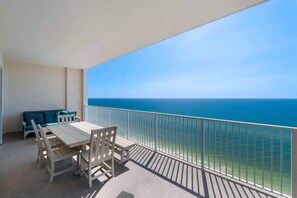 Outdoor dining - Gulf-Front 4BR Condo | Huge Balcony | Pier Park (Panama City Beach)