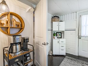 A kitchenette with a coffee maker, a microwave, and a refrigerator. - Boho Blue Heron, BBH 7532 (Birch Bay)