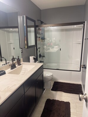 Hair dryer, towels, soap, shampoo