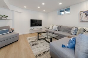 Living area - Cozy 2BR Retreat Near Lonsdale w/ Private Yard (North Vancouver)