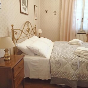 Frette Italian sheets, premium bedding, memory-foam beds, desk