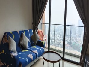 Living area - 2-bedroom apartment in beautiful Kuala Lumpur with AC and gym access (Kuala Lumpur)