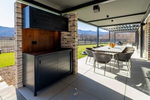 Outdoor dining - Luxury 3BR Mountain Spa Villa with Heated Pool (Sveti Rok)
