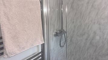 Hair dryer, towels, soap, shampoo