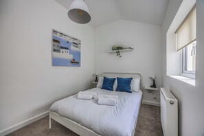 1 dormitorio, tabla de planchar con plancha, wifi gratis y ropa de cama