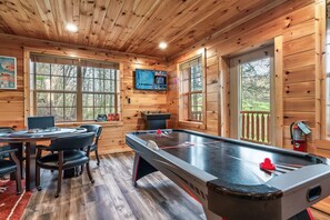 A wooden interior with a pool table, chairs, and a mounted video game console. - Hot Tub Hideaway! 5 Min to Parkway | Cozy n Quiet! (Pigeon Forge)