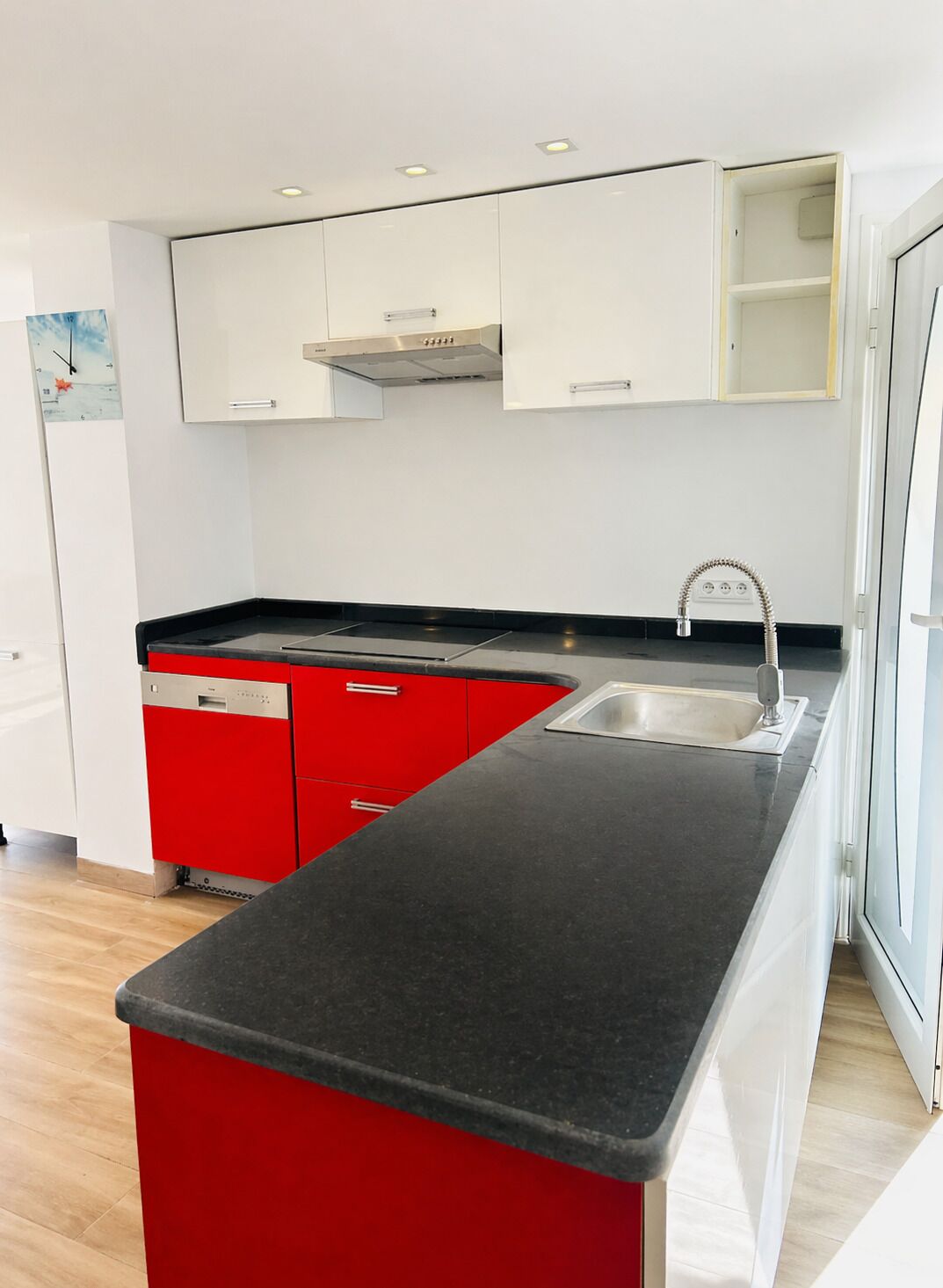Fridge, stovetop, dishwasher, coffee/tea maker