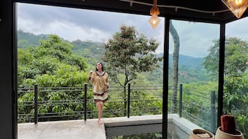 Deluxe Suite, Balcony, Mountain View | Minibar, in-room safe, individually decorated, blackout drapes