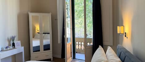 Deluxe Double Room, Balcony | In-room safe, desk, iron/ironing board, free WiFi