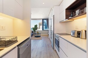 Fridge, microwave, oven, stovetop - Perfect City Living | Rooftop Pool and Views (Cape Town)