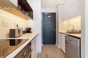 Fridge, microwave, oven, stovetop - Perfect City Living | Rooftop Pool and Views (Cape Town)