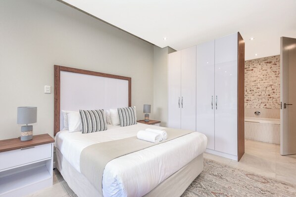 In-room safe, iron/ironing board, Internet, bed sheets - Melrose on Oak | Sleek City Apartment Retreat (Johannesburg)