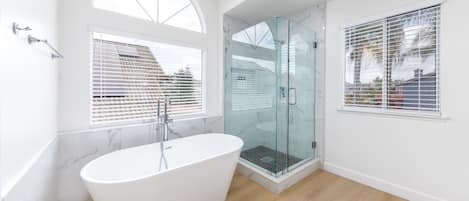 Shower, hair dryer, towels, toilet paper