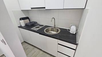Fridge, microwave, stovetop, electric kettle