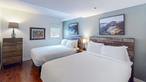 A hotel room with two beds, a wooden dresser, and artwork on the walls. - Spacious Mountain Walk Home, Steps to Blue! (The Blue Mountains)
